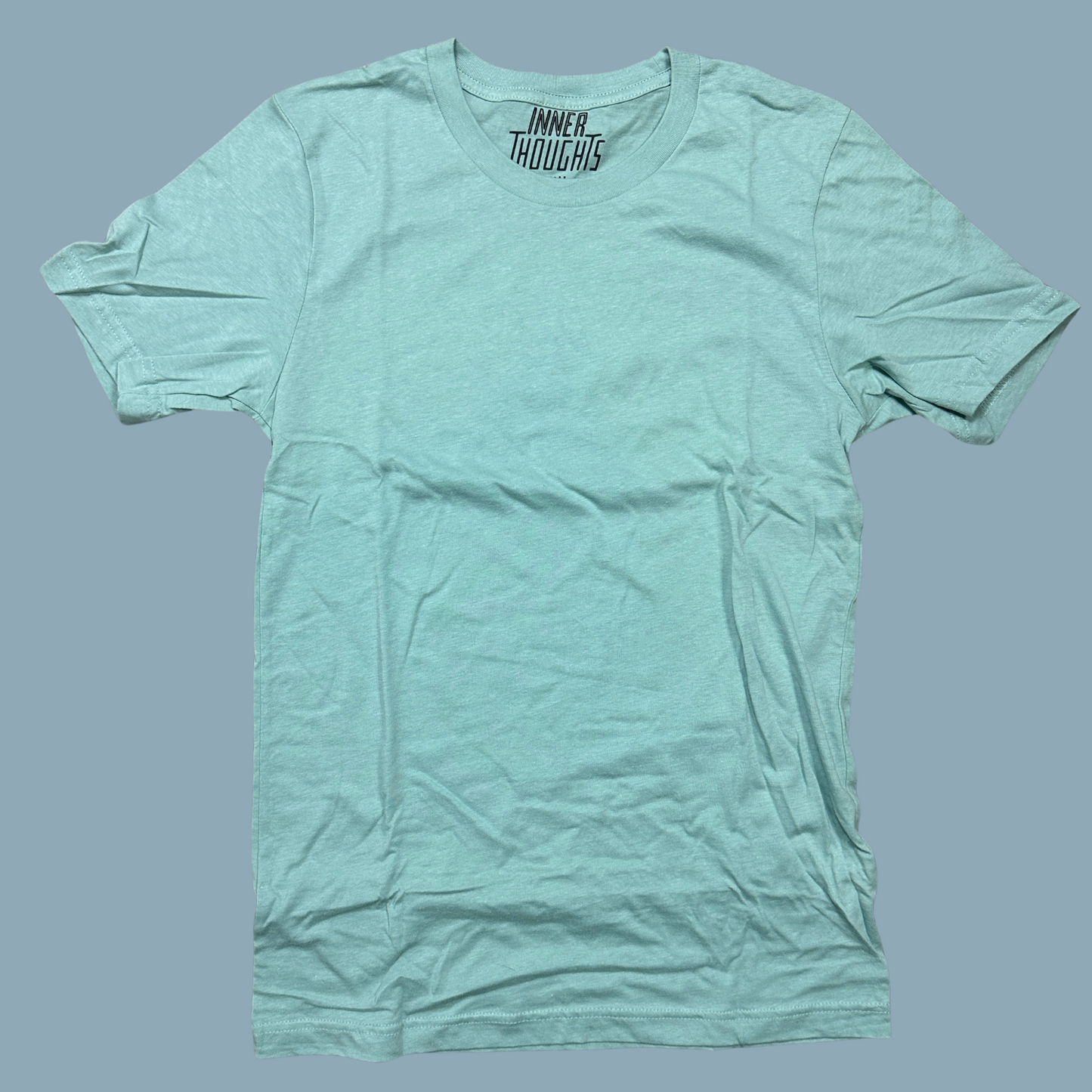 dusty blue shirt with I Did It For Me print on the back with a blue fade look within the design