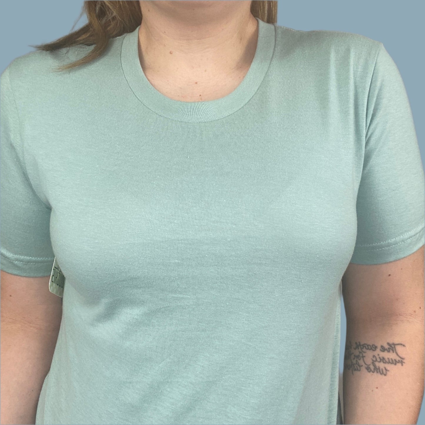 dusty blue shirt with I Did It For Me print on the back with a blue fade look within the design
