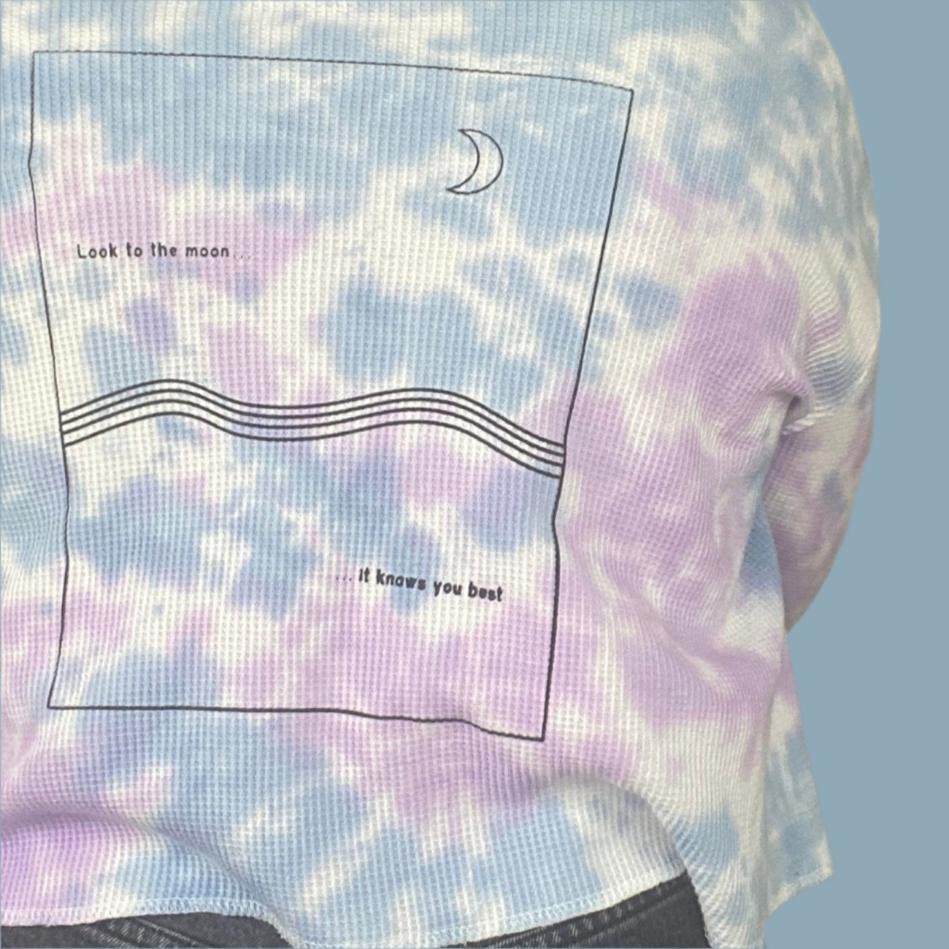 light blue, lilac and white tie dyed thermal with inner thoughts prints on the front and back