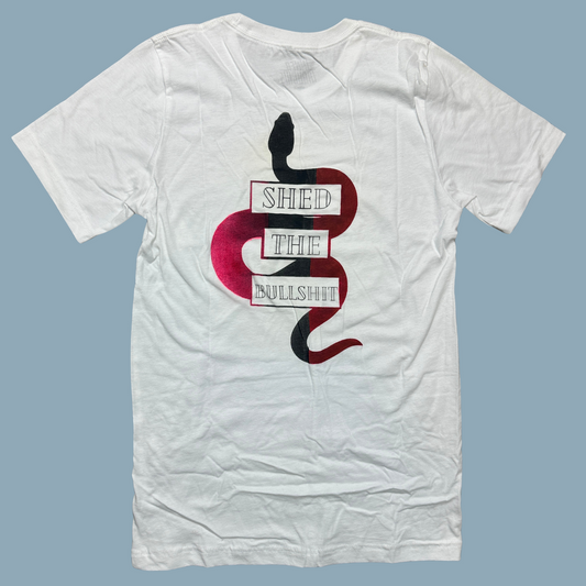 Plain white tee with "Shed the Bullshit" print on the back with Pink faded areas on the snake