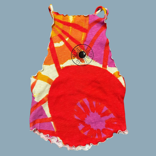 orange, pink, red, and yellow sunset pattern high neck tank top with an open back with the Night Sk(eye) design on the front